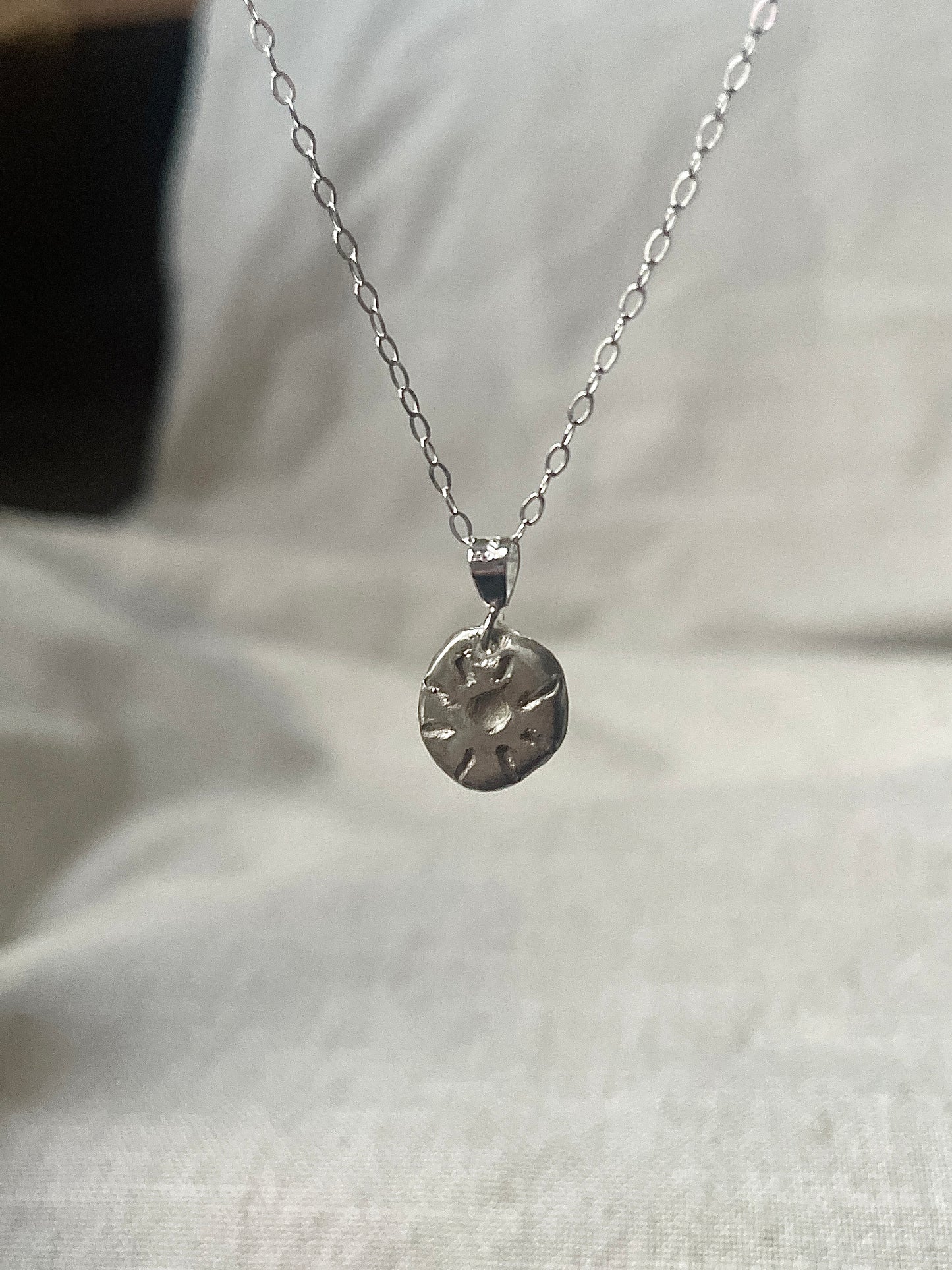 Carved Sun Pebble Necklace